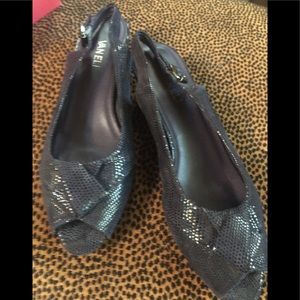 Brand new, navy wedge shoes from Vaneli!